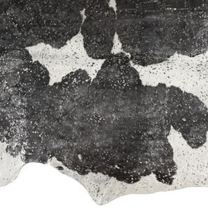 Homeroots 5' X 7' Black And White Cowhide Hand Knotted Area Rug Black And White Cowhide 544359