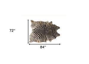 Homeroots 5' X 7' Brown And Black Cowhide Hand Knotted Area Rug Black And White Cowhide 544362