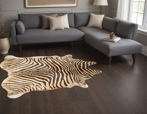 Homeroots 5' X 7' Beige And Brown Cowhide Hand Knotted Area Rug Natural And Brown Cowhide 544364