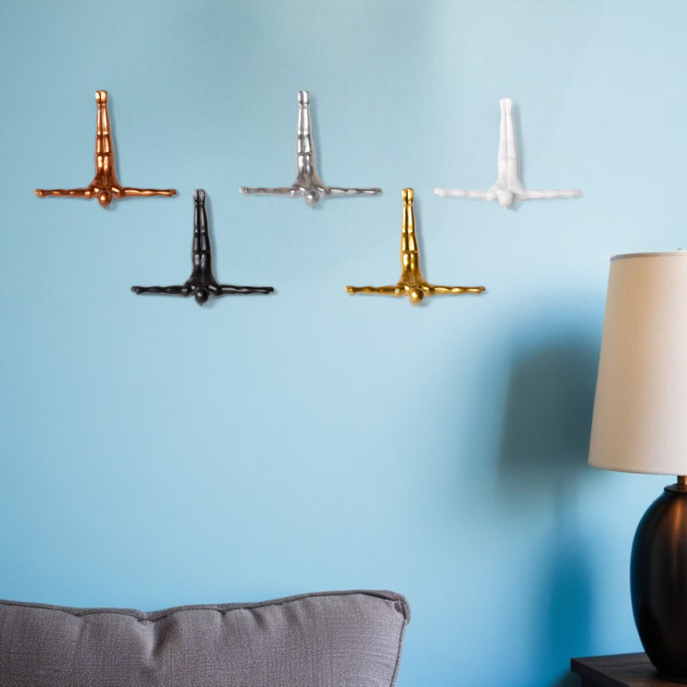 HomeRoots Set of Five Modern Diving Man Resin Sculptures - Dynamic Wall Art for Contemporary Spaces 544462