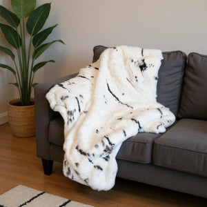 HomeRoots 50" Luxurious Black and White Rabbit Fur Plush Throw Blanket for Cozy Elegance and Warmth 544561