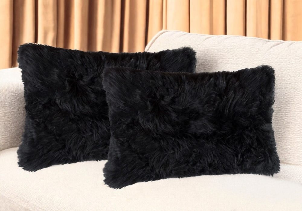 HomeRoots Set of Two Luxurious 12" x 20" Black Sheepskin Lumbar Pillows for Elegant Home Décor & Comfort 544563