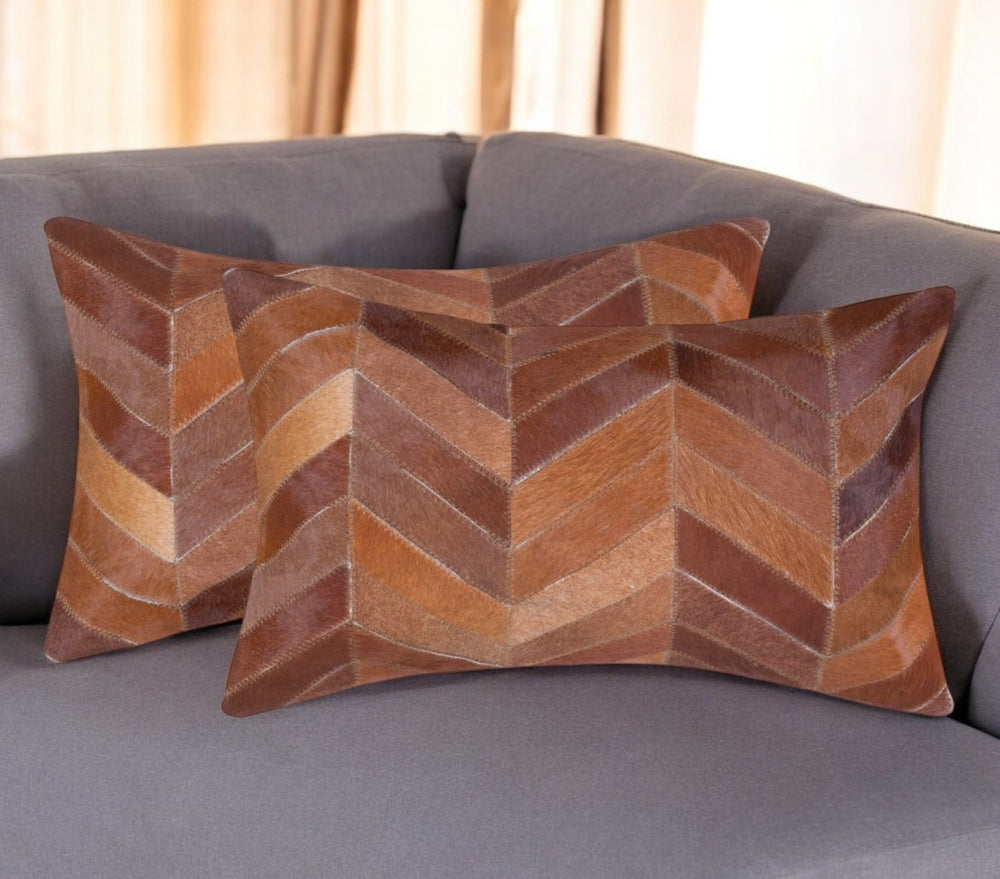 HomeRoots Set of Two Tan Chevron Cowhide Lumbar Pillows – Rustic Elegance for Home Decor & Gifting 544588