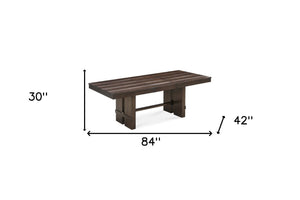 HomeRoots 84" Dark Brown Wood Trestle Base Dining Table with Self-Storing Leaf for Rustic Elegance & Functionality 544748