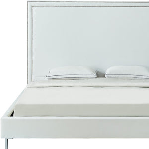 HomeRoots White Faux Leather King Bed Frame with Nailhead Trim - Modern Style, Plush Comfort, Sleek Design 544783