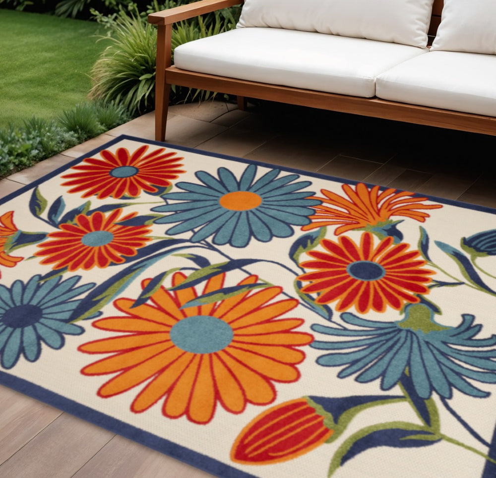 HomeRoots 10' Vibrant Floral Ivory, Blue & Orange Area Rug - Durable Indoor Outdoor Design for High-Traffic Spaces 545032