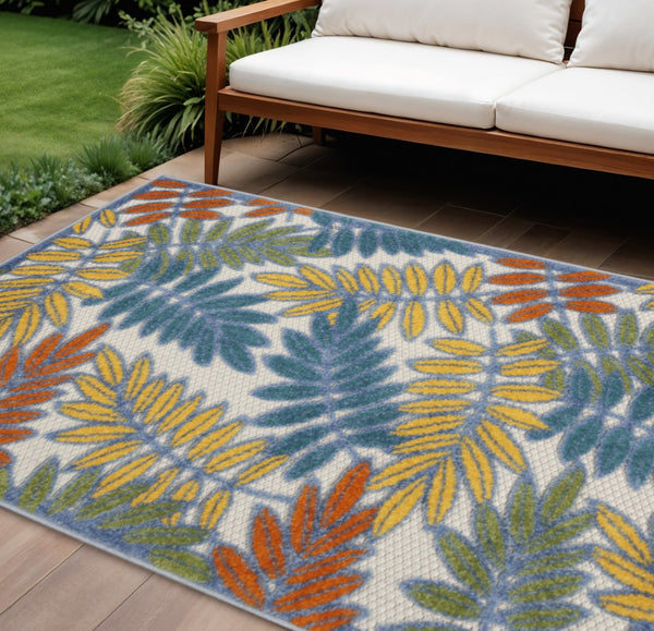 HomeRoots 10' X 14' Vibrant Palm Leaf Indoor Outdoor Area Rug – Durable, Easy-Care, Coastal Style for Any Space 545040