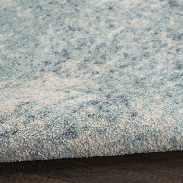 HomeRoots 8' Blue and Ivory Abstract Area Rug - Modern Power Loom Design for Effortless Style and Durability 8' X 10' 545086