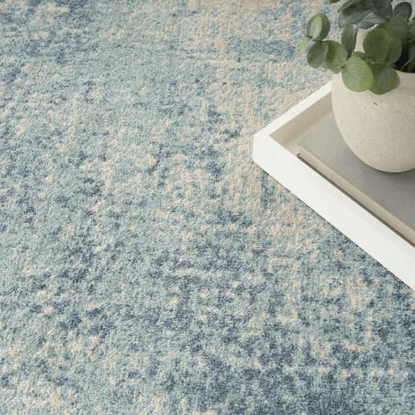 HomeRoots 8' Blue and Ivory Abstract Area Rug - Modern Power Loom Design for Effortless Style and Durability 8' X 10' 545086
