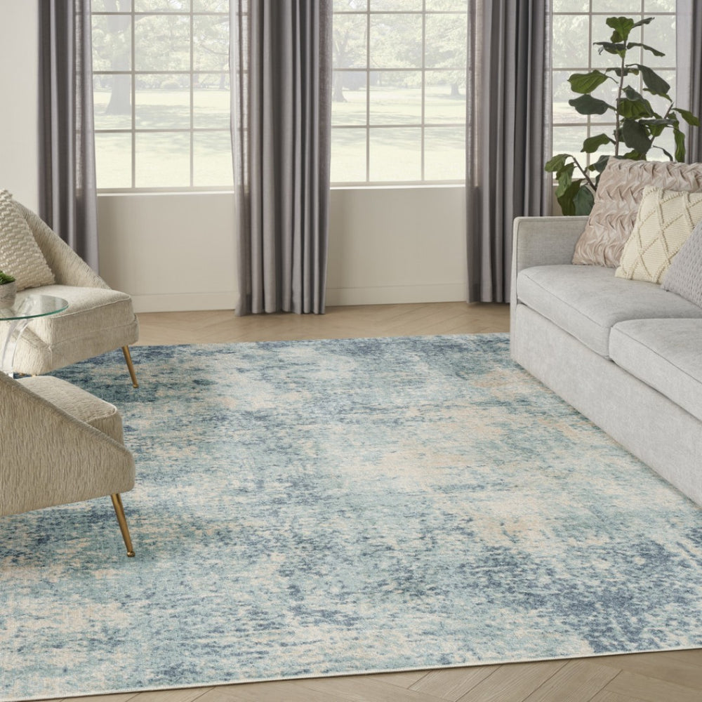 HomeRoots 9' Blue and Ivory Abstract Area Rug - Power Loomed, Washable, Durable & Perfect for High-Traffic Spaces 9' X 12' 545087