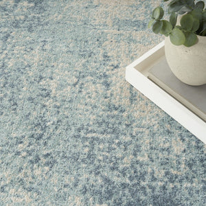 HomeRoots 9' Blue and Ivory Abstract Area Rug - Power Loomed, Washable, Durable & Perfect for High-Traffic Spaces 9' X 12' 545087