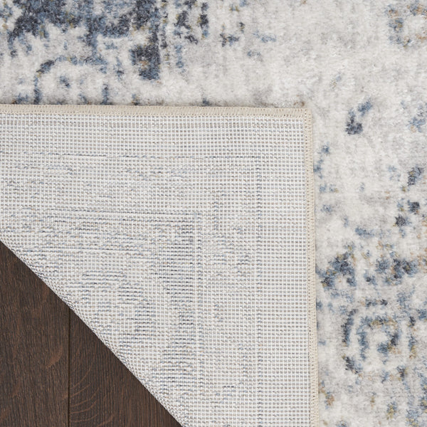 Homeroots 5' X 7' Blue And Ivory Floral Medallion Power Loom Distressed Washable Area Rug  Polyester 545097