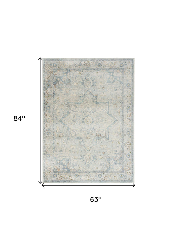 Homeroots 5' X 7' Blue And Ivory Floral Medallion Power Loom Distressed Washable Area Rug  Polyester 545097