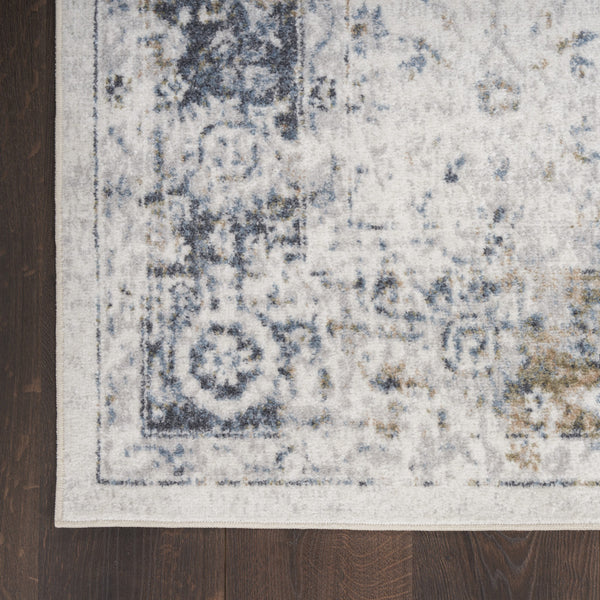 Homeroots 7' X 9' Blue And Ivory Floral Medallion Power Loom Distressed Washable Area Rug  Polyester 545098