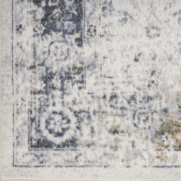 Homeroots 7' X 9' Blue And Ivory Floral Medallion Power Loom Distressed Washable Area Rug  Polyester 545098