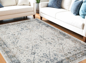 Homeroots 8' X 10' Blue And Ivory Floral Medallion Power Loom Distressed Washable Area Rug  Polyester 545099