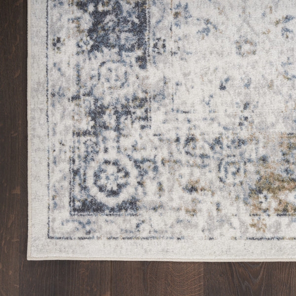 Homeroots 9' X 12' Blue And Ivory Floral Medallion Power Loom Distressed Washable Area Rug  Polyester 545100