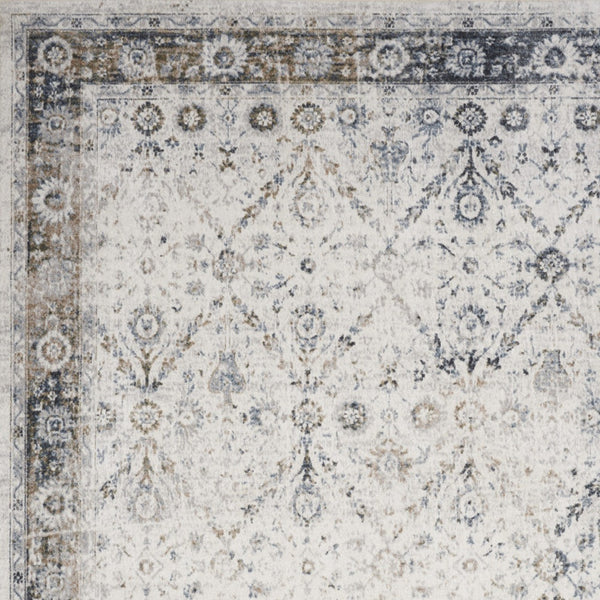 Homeroots 9' X 12' Blue And Ivory Floral Medallion Power Loom Distressed Washable Area Rug  Polyester 545100