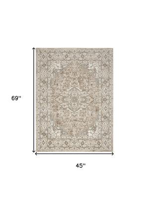 Homeroots 4' X 6' Beige And Ivory Medallion Power Loom Distressed Area Rug  Polypropylene,Polyester 545116