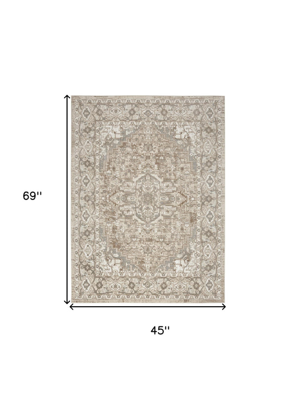 Homeroots 4' X 6' Beige And Ivory Medallion Power Loom Distressed Area Rug  Polypropylene,Polyester 545116