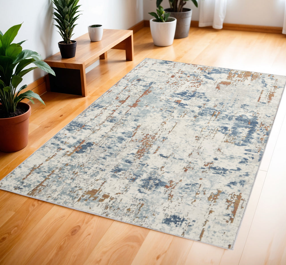 Homeroots 4' X 6' Beige And Blue Abstract Power Loom Area Rug  Polypropylene,Polyester 545120