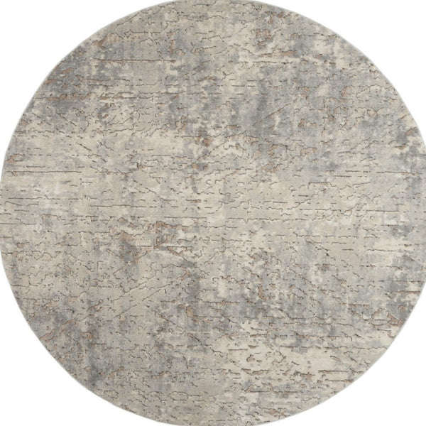 HomeRoots 8' Round Abstract Area Rug in Beige and Gray - Modern Power Loomed Design for Stylish Spaces 545132
