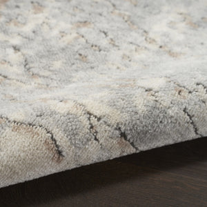 HomeRoots 8' Round Abstract Area Rug in Beige and Gray - Modern Power Loomed Design for Stylish Spaces 545132