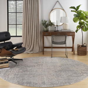 HomeRoots 8' Round Abstract Area Rug in Beige and Gray - Modern Power Loomed Design for Stylish Spaces 545132