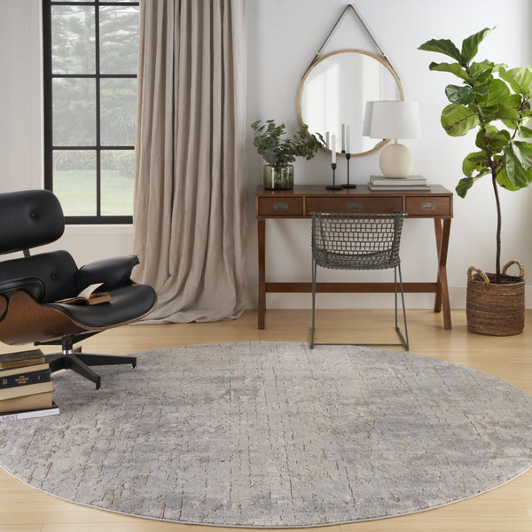 HomeRoots 8' Round Abstract Area Rug in Beige and Gray - Modern Power Loomed Design for Stylish Spaces 545132