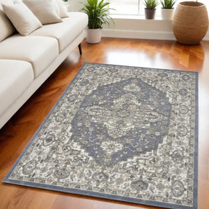 Homeroots 5' X 7' Blue And Ivory Medallion Power Loom Distressed Area Rug  Polypropylene,Polyester 545151