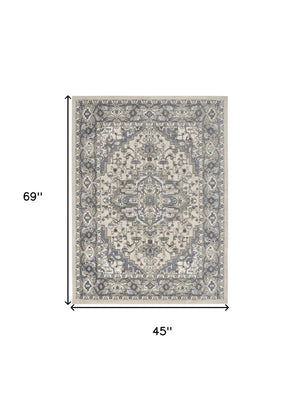 Homeroots 4' X 6' Blue And Ivory Medallion Power Loom Distressed Area Rug  Polypropylene,Polyester 545162