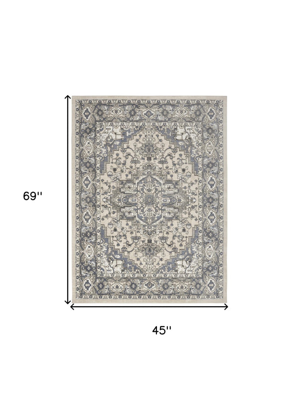 Homeroots 4' X 6' Blue And Ivory Medallion Power Loom Distressed Area Rug  Polypropylene,Polyester 545162