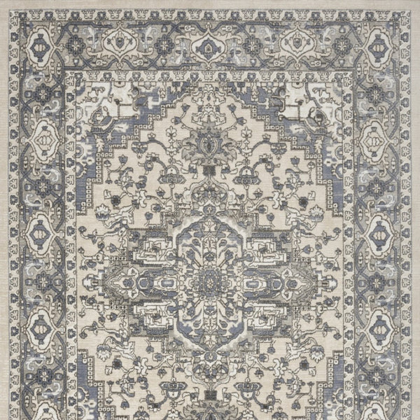 HomeRoots 5' Blue and Ivory Medallion Power Loom Area Rug - Vintage Charm, Distressed Design for Any Space 5' X 7' 545164