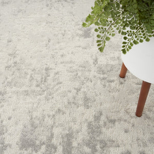 HomeRoots 8' Gray and Ivory Abstract Area Rug - Modern Power-Loomed Design for Stylish Living Spaces 8' X 10' 545169