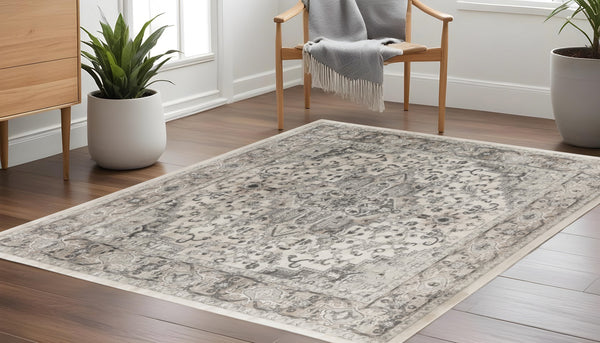 Homeroots 10' Gray And Ivory Square Medallion Power Loom Distressed Area Rug  Polypropylene,Polyester 545182
