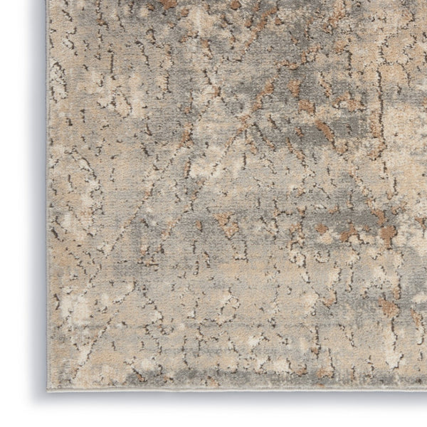 HomeRoots 9' Modern Beige and Gray Abstract Power Loom Area Rug for Effortless Style and Versatile Living Spaces 7' X 10' 545203
