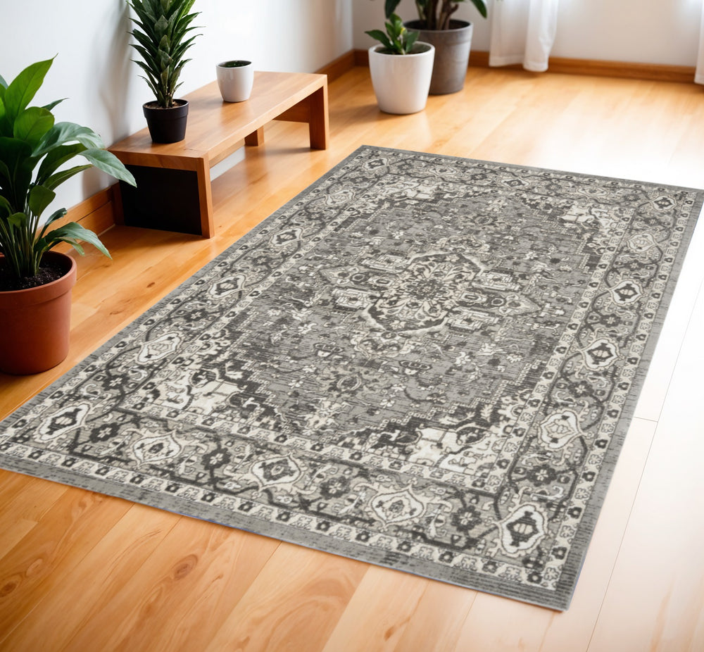 Homeroots 4' X 6' Gray And Ivory Medallion Power Loom Distressed Area Rug  Polypropylene,Polyester 545205