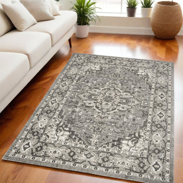 HomeRoots 5' Gray and Ivory Medallion Power Loom Distressed Area Rug for Timeless Charm and Comfort 5' X 7' 545207