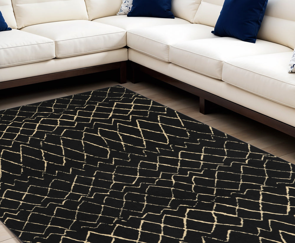 Homeroots 7' X 10' Black And Ivory Abstract Power Loom Distressed Area Rug  Polypropylene 545302