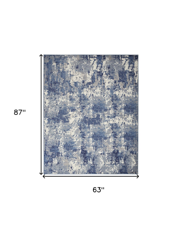 Homeroots 5' X 7' Blue And Ivory Abstract Power Loom Area Rug  Polypropylene 545333