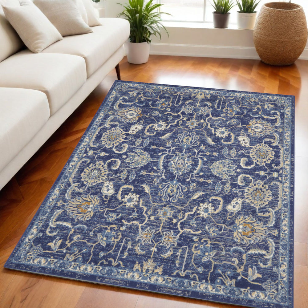 Homeroots 5' X 7' Blue And Beige Floral Power Loom Area Rug  Polypropylene 545352