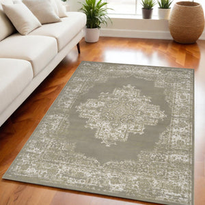 Homeroots 5' X 7' Green And Ivory Medallion Power Loom Distressed Area Rug  Polypropylene 545394