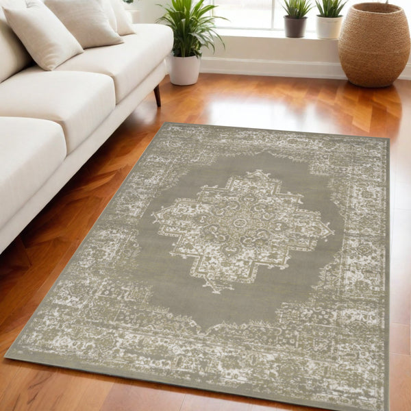 Homeroots 5' X 7' Green And Ivory Medallion Power Loom Distressed Area Rug  Polypropylene 545394