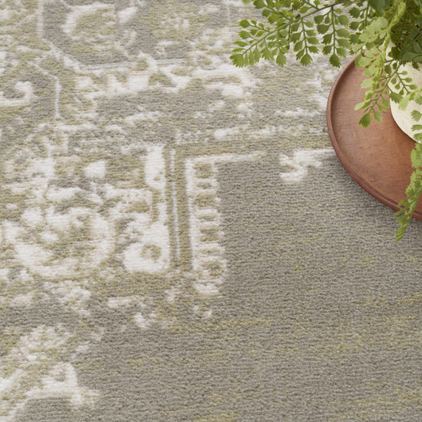 Homeroots 5' X 7' Green And Ivory Medallion Power Loom Distressed Area Rug  Polypropylene 545394