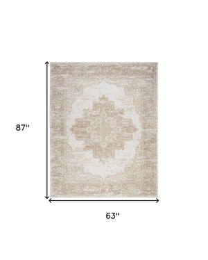 Homeroots 5' X 7' Beige And Ivory Medallion Power Loom Distressed Area Rug  Polypropylene 545415