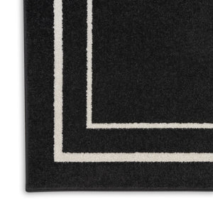 HomeRoots 10' X 14' Black And Ivory Area Rug – Durable Indoor/Outdoor Design for Modern Spaces & Easy Care 545467