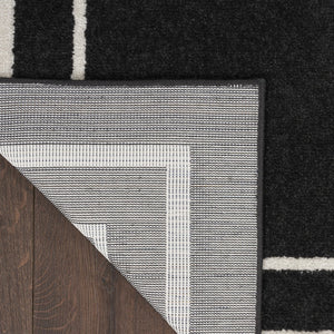 HomeRoots 10' X 14' Black And Ivory Area Rug – Durable Indoor/Outdoor Design for Modern Spaces & Easy Care 545467