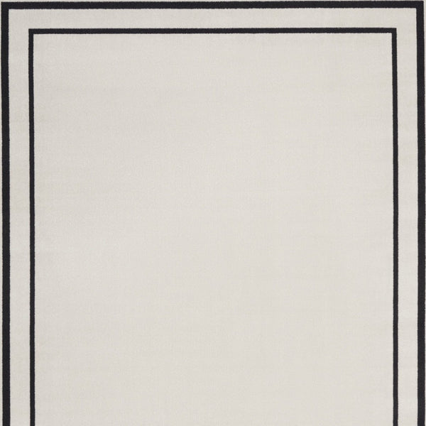 HomeRoots 10' X 14' Ivory and Black Area Rug - Stylish, Durable, and Versatile for Indoor & Outdoor Spaces! 545471