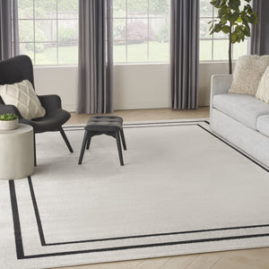 HomeRoots 10' X 14' Ivory and Black Area Rug - Stylish, Durable, and Versatile for Indoor & Outdoor Spaces! 545471
