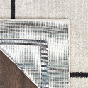 HomeRoots 10' X 14' Ivory and Black Area Rug - Stylish, Durable, and Versatile for Indoor & Outdoor Spaces! 545471